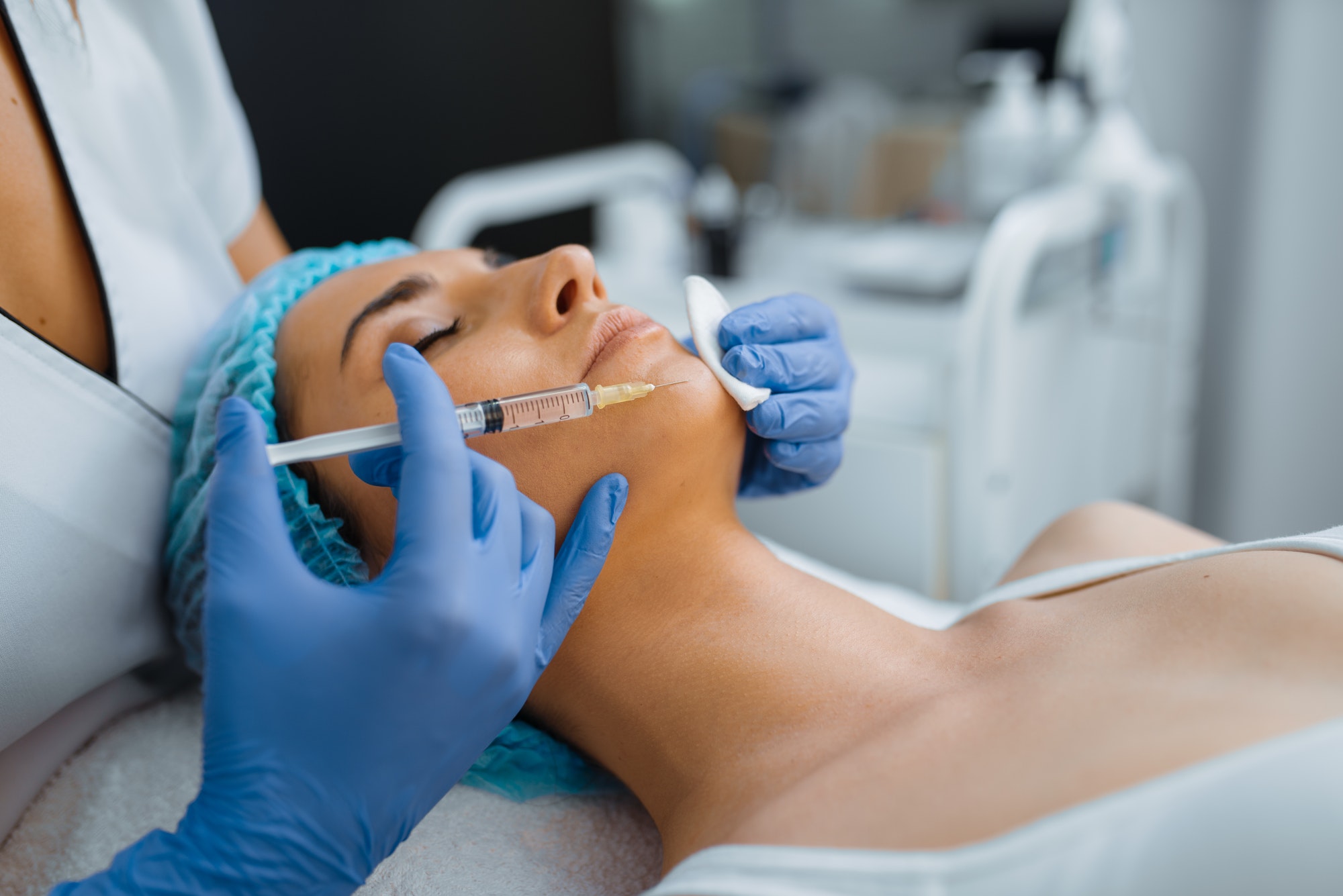 cosmetician-gives-chin-botox-injection-to-patient.jpg cosmetician-gives-chin-botox-injection-to-patient.jpg